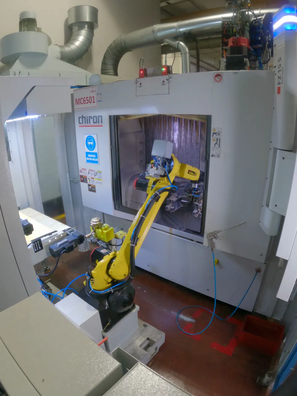 Robot and Chiron machining center