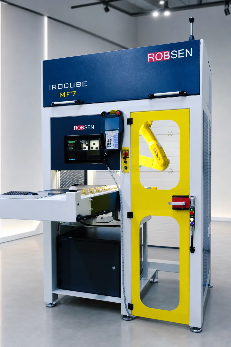 IROCUBE M7 with its yellow operator door and loading conveyor