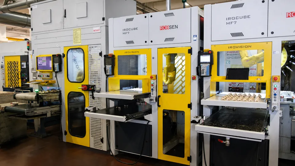 IROCUBE M7 cells, each loading its own Robodrill