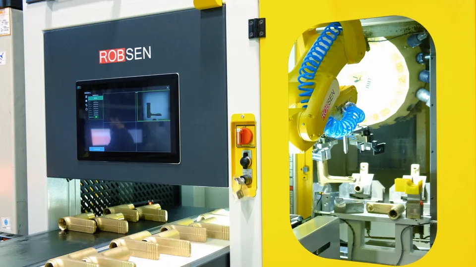 Operator panel and robot behind the safety door