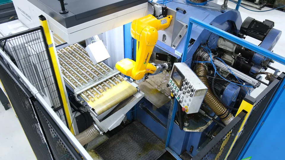 Stäubli TX2-60L picking a brass part