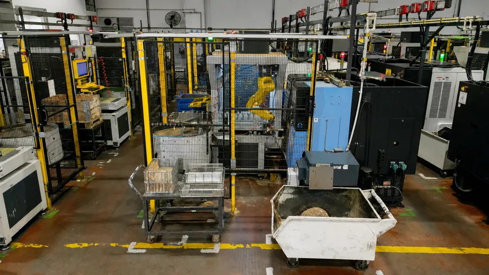 T Series cell behind its guarding at the lathe